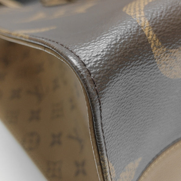 ONTHEGO GM Monogram Coated Canvas Brown