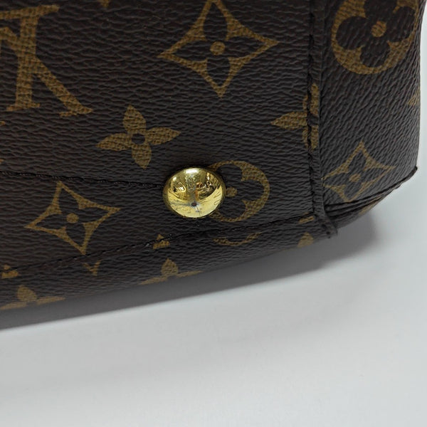 MONTAIGNE GM Monogram Coated Canvas Brown