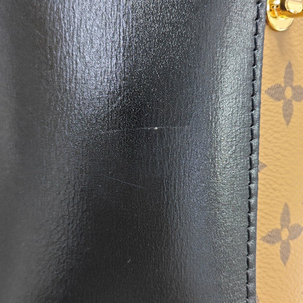 CANNES PM Monogram Coated Canvas Brown