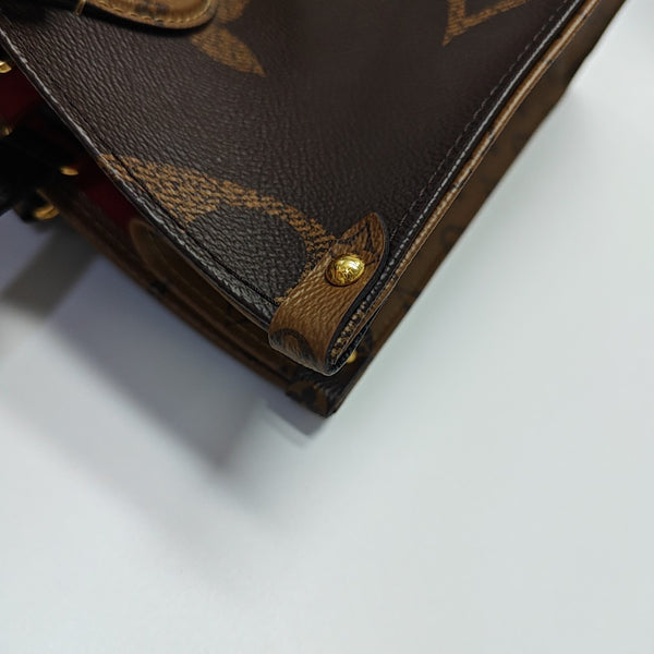 ONTHEGO MM Monogram Coated Canvas Brown