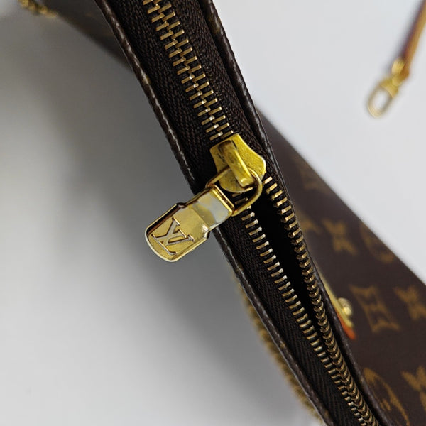 EVA Monogram Coated Canvas Brown