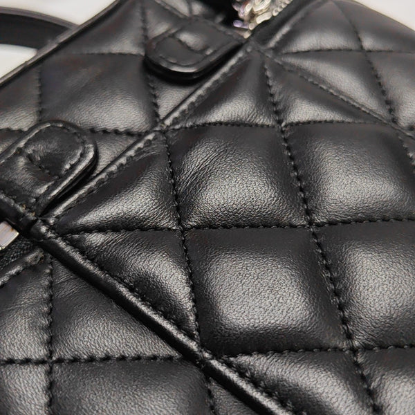 NECESER Piel de cordero acolchada Negro