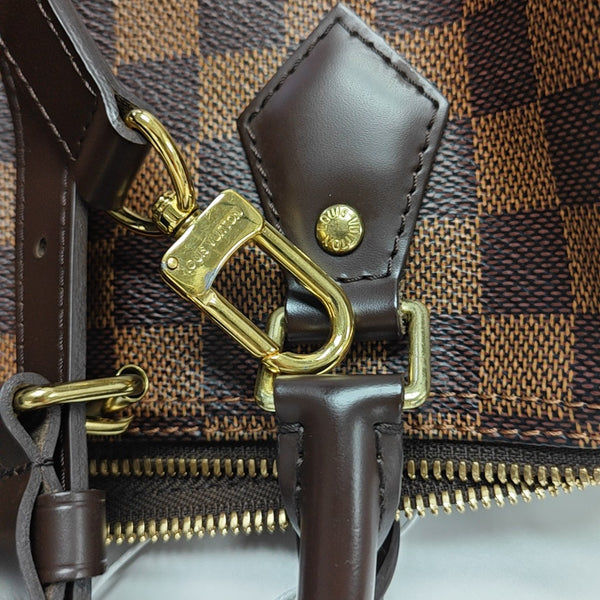SPEEDY 25 Damier Ebene Coated Canvas Brown