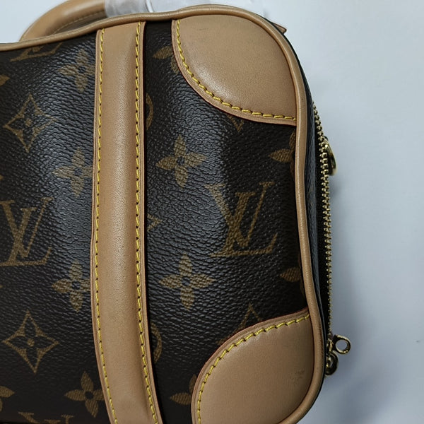 LUGGAGE Monogram Coated Canvas Brown