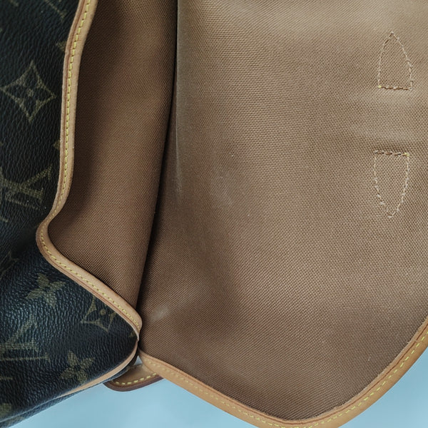 SAUMUR Monogram Coated Canvas Brown