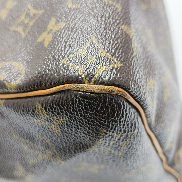 SPEEDY 25 Monogram Coated Canvas Brown
