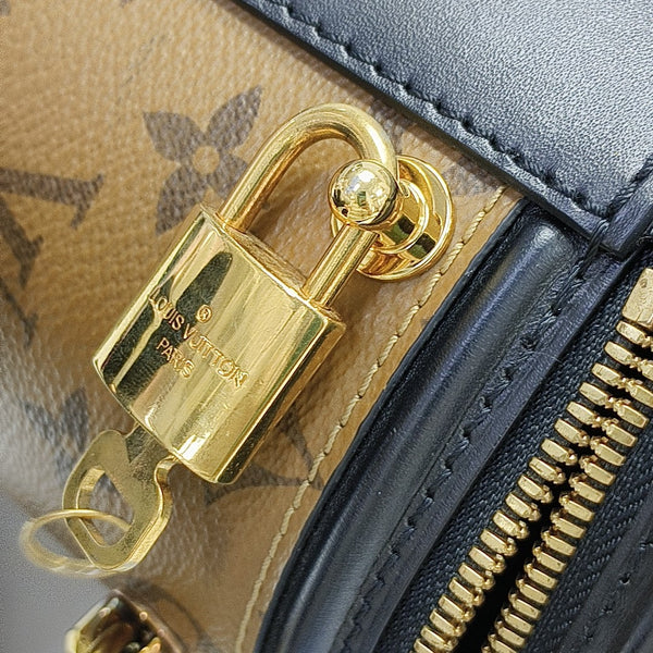 CANNES PM Monogram Coated Canvas Brown
