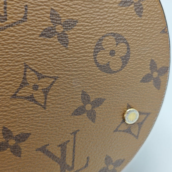 CANNES PM Monogram Coated Canvas Brown