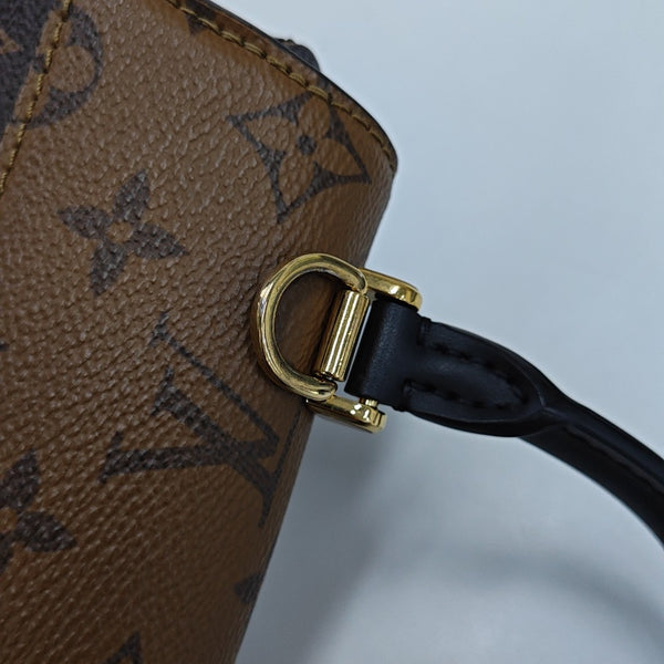 EDEN Monogram Coated Canvas Brown