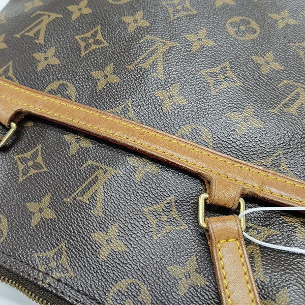 COUSSIN GM Monogram Coated Canvas Brown