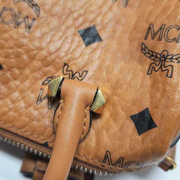 ESSENTIAL Monogram Coated Canvas Brown
