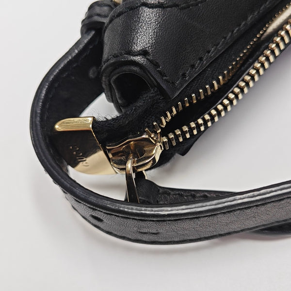 Monogram Calfskin Top Handle Bag Black