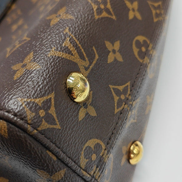 VÉNUS Monogram Coated Canvas Brown