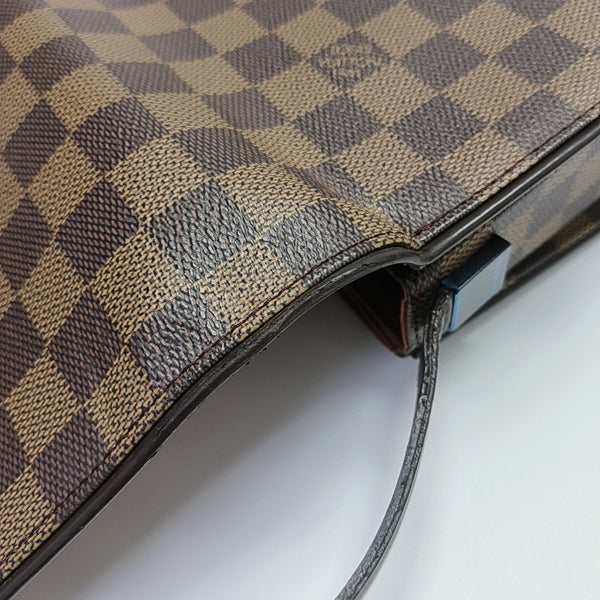 TRIBECA Damier Ebene Coated Canvas Brown