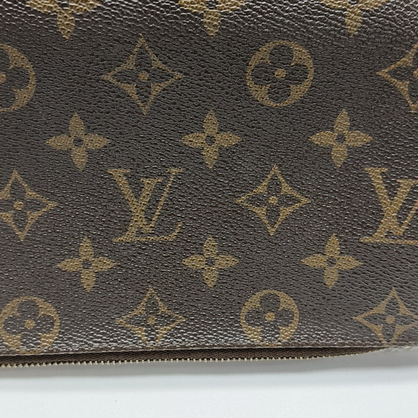 Pochette Eva Monogram Coated Canvas Brown