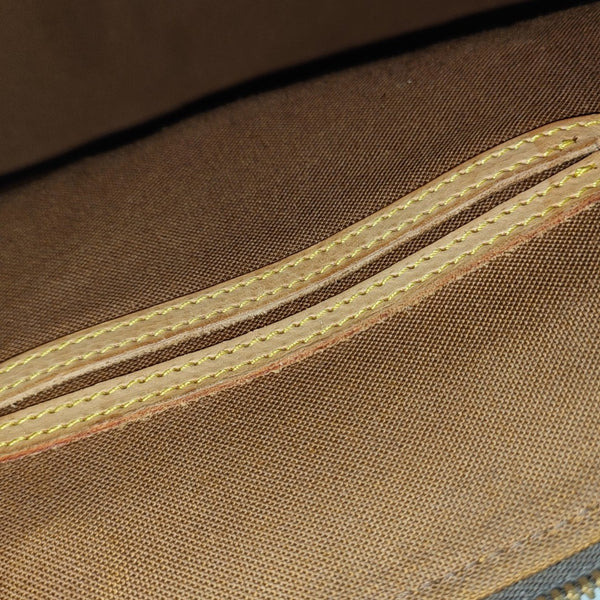 ALMA PM Monogram Coated Canvas Brown