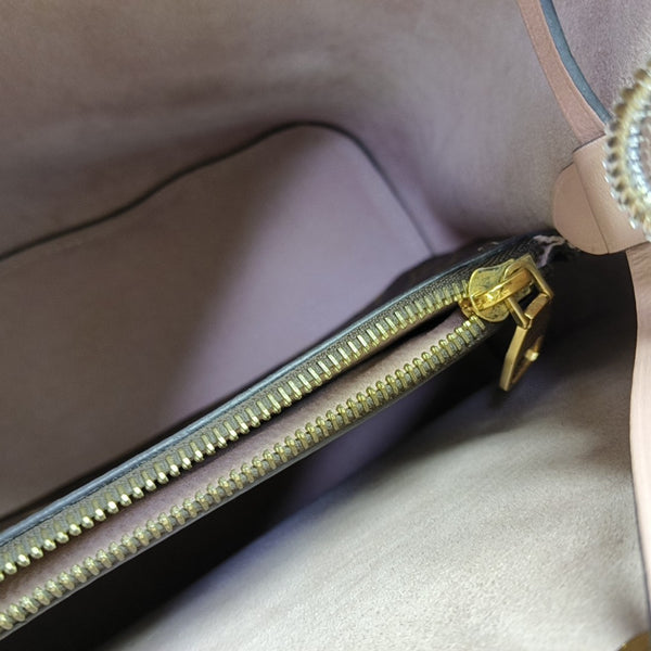 NÉONOÉ MM Monogram Coated Canvas Brown