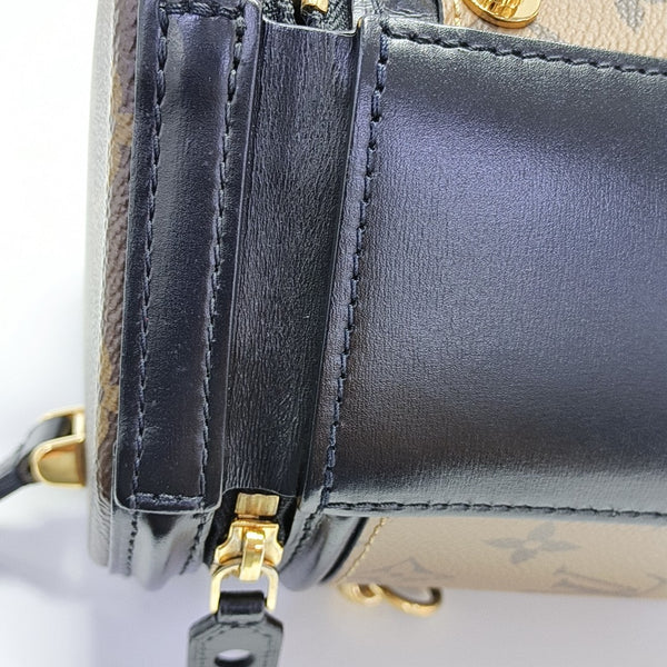 CANNES PM Monogram Coated Canvas Brown