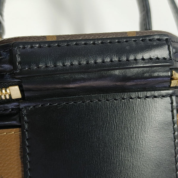CANNES PM Monogram Coated Canvas Brown