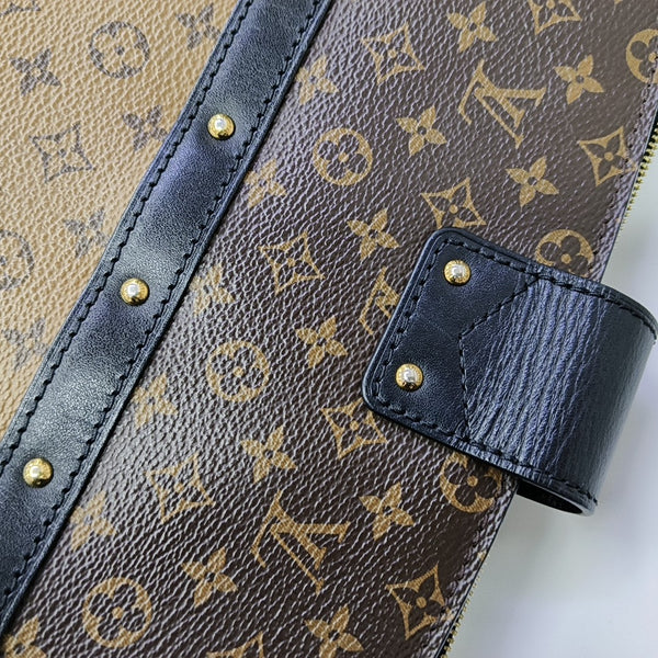TRUNK Monogram Coated Canvas Brown