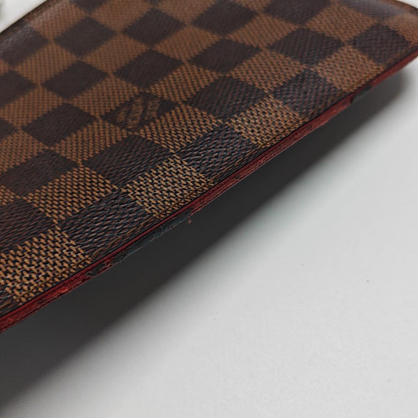 Damier Ebene Coated Canvas Clutch Brown