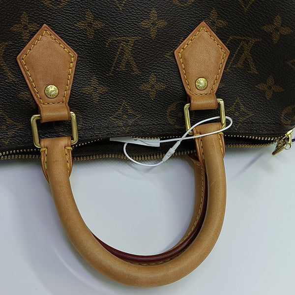 SPEEDY 25 Monogram Coated Canvas Brown