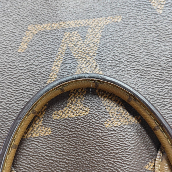 ONTHEGO MM Monogram Coated Canvas Brown