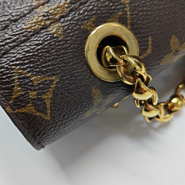 VICTOIRE Monogram Coated Canvas Brown