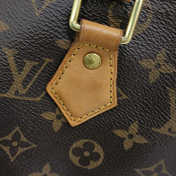 SPEEDY 25 Monogram Coated Canvas Brown