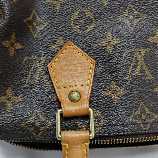 SPEEDY 25 Monogram Coated Canvas Brown