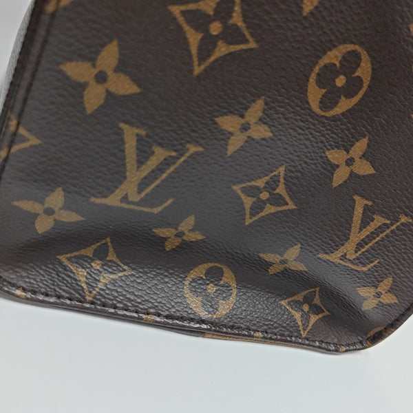 ONTHEGO MM Monogram Coated Canvas Brown