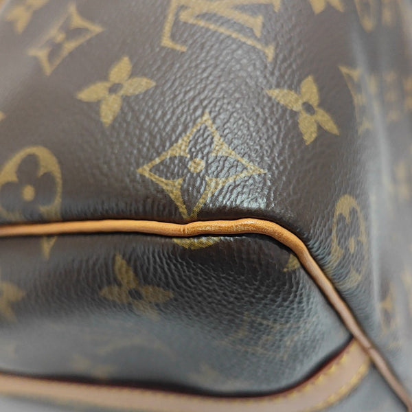 SPEEDY 25 Monogram Coated Canvas Brown