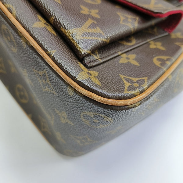 EXCENTRI-CITE Monogram Coated Canvas Brown
