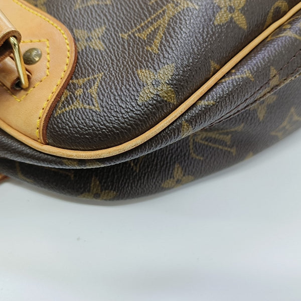 EXCURSION Monogram Coated Canvas Brown
