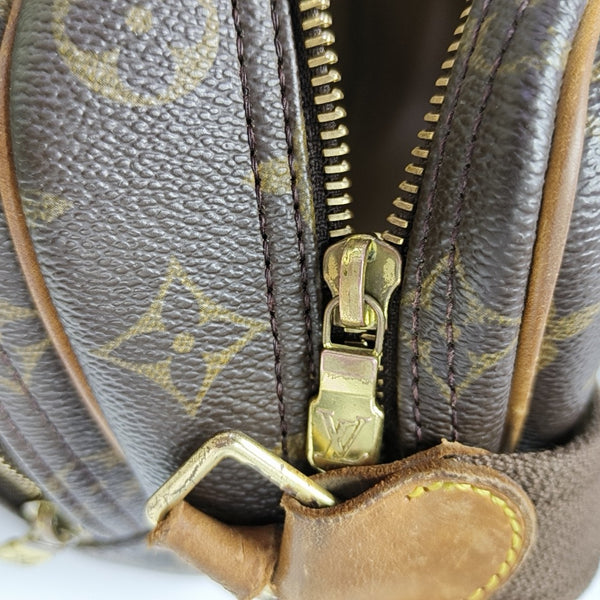 REPORTER PM Monogram Coated Canvas Brown