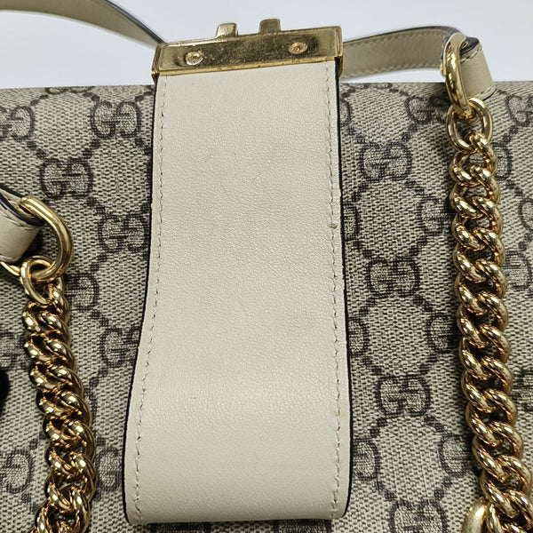 Padlock Small Monogram Coated Canvas Beige
