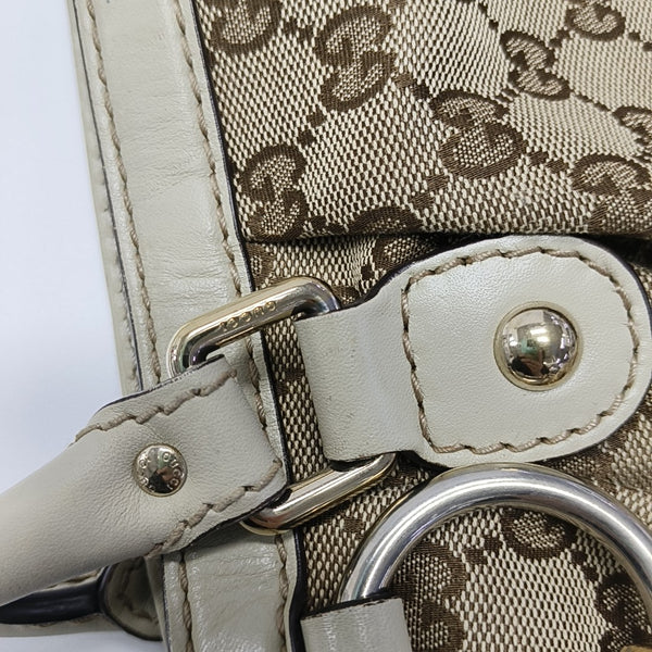 Sukey Monogram Canvas Brown