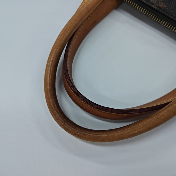 RIVOLI MM Monogram Coated Canvas Brown