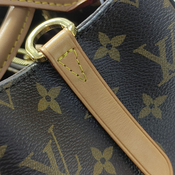 MONTAIGNE Monogram Coated Canvas Brown