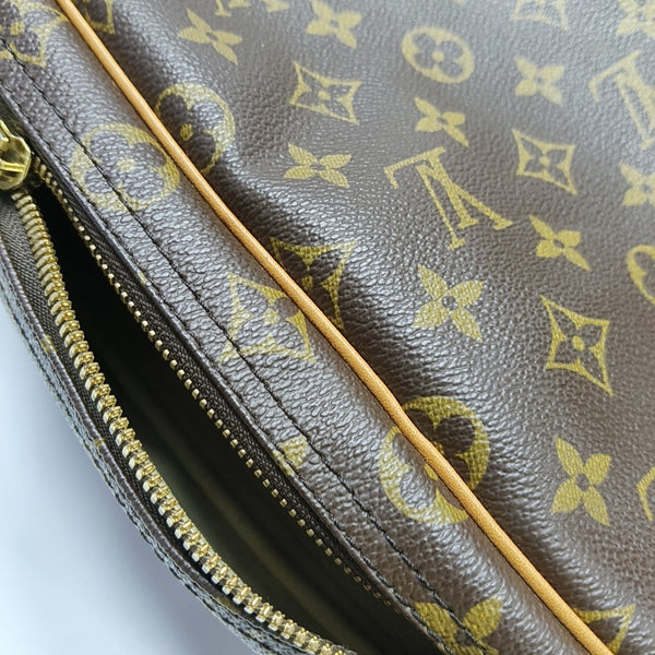 EXCURSION Monogram Coated Canvas Brown