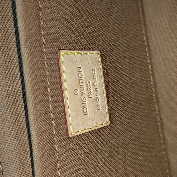 TIKAL Monogram Coated Canvas Brown