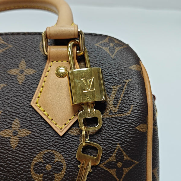 SPEEDY 20 Monogram Coated Canvas Brown