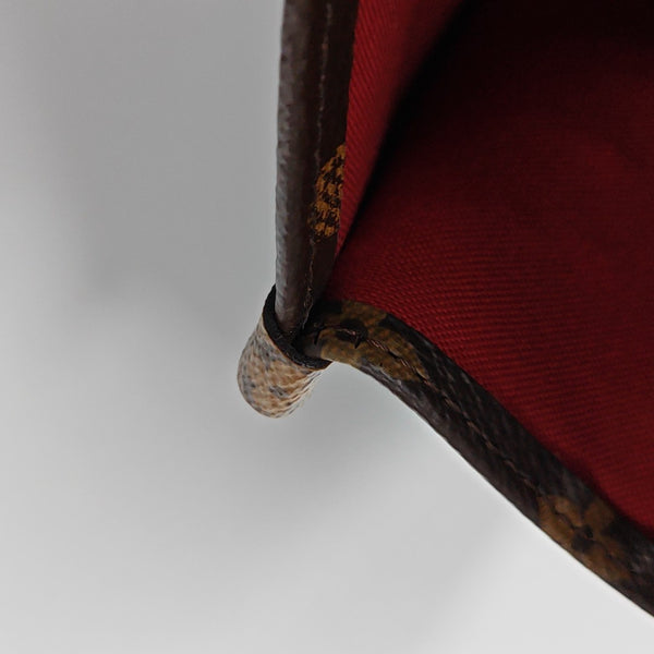 ONTHEGO MM Monogram Coated Canvas Brown