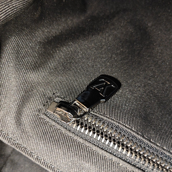 VOYAGER PM Monogram Coated Canvas Black