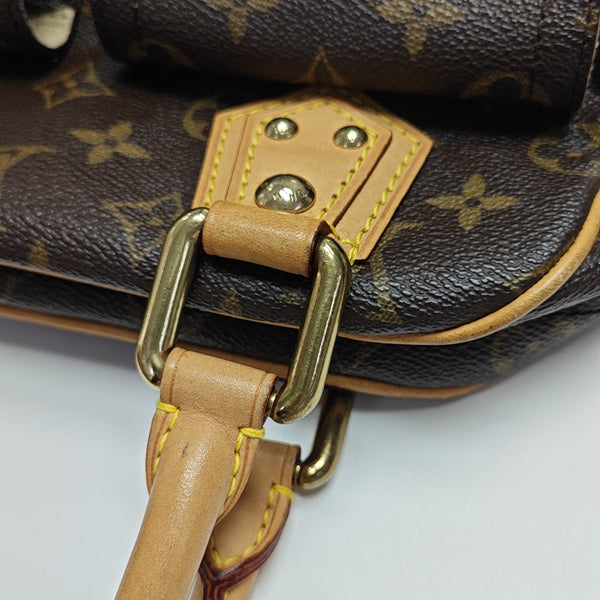 MANHATTAN PM Monogram Coated Canvas Brown