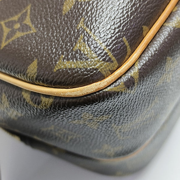REPORTER PM Monogram Coated Canvas Brown