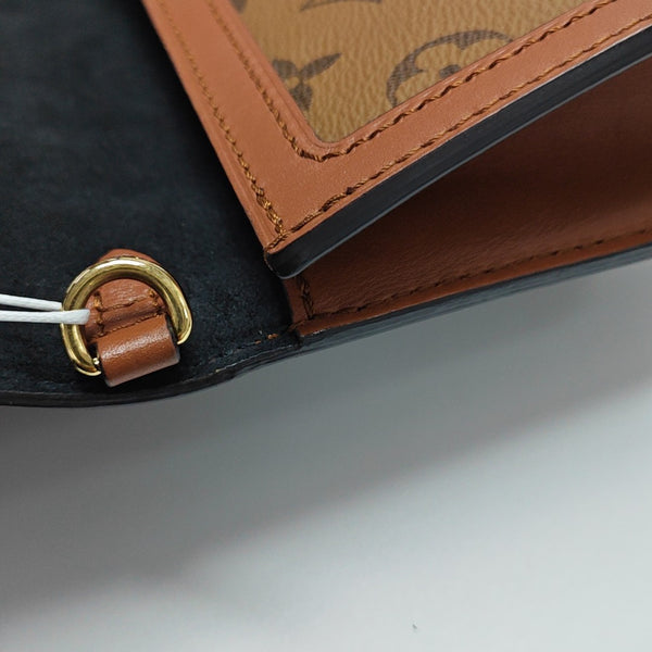 DAUPHINE Monogram Coated Canvas Brown