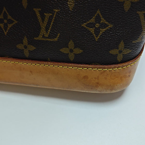ALMA PM Monogram Coated Canvas Brown