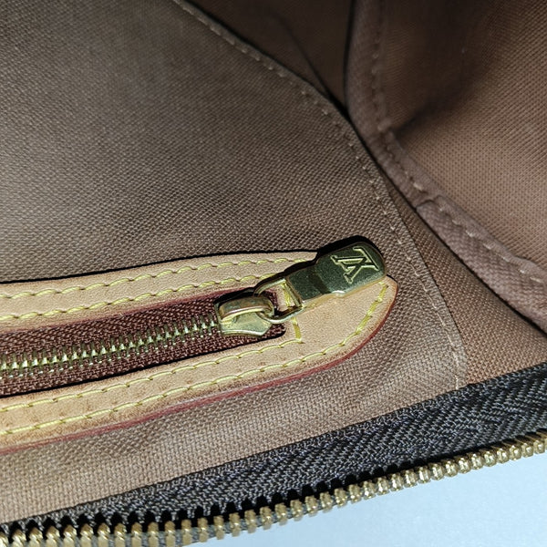 SPEEDY 25 Monogram Coated Canvas Brown