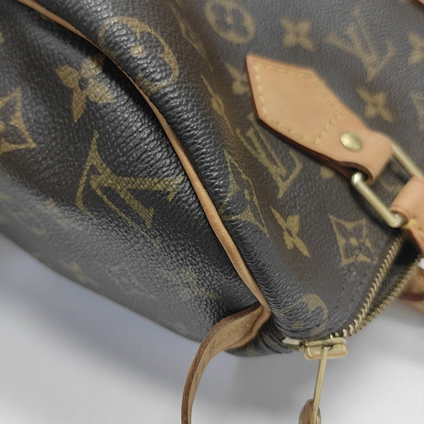 SPEEDY 25 Monogram Coated Canvas Brown